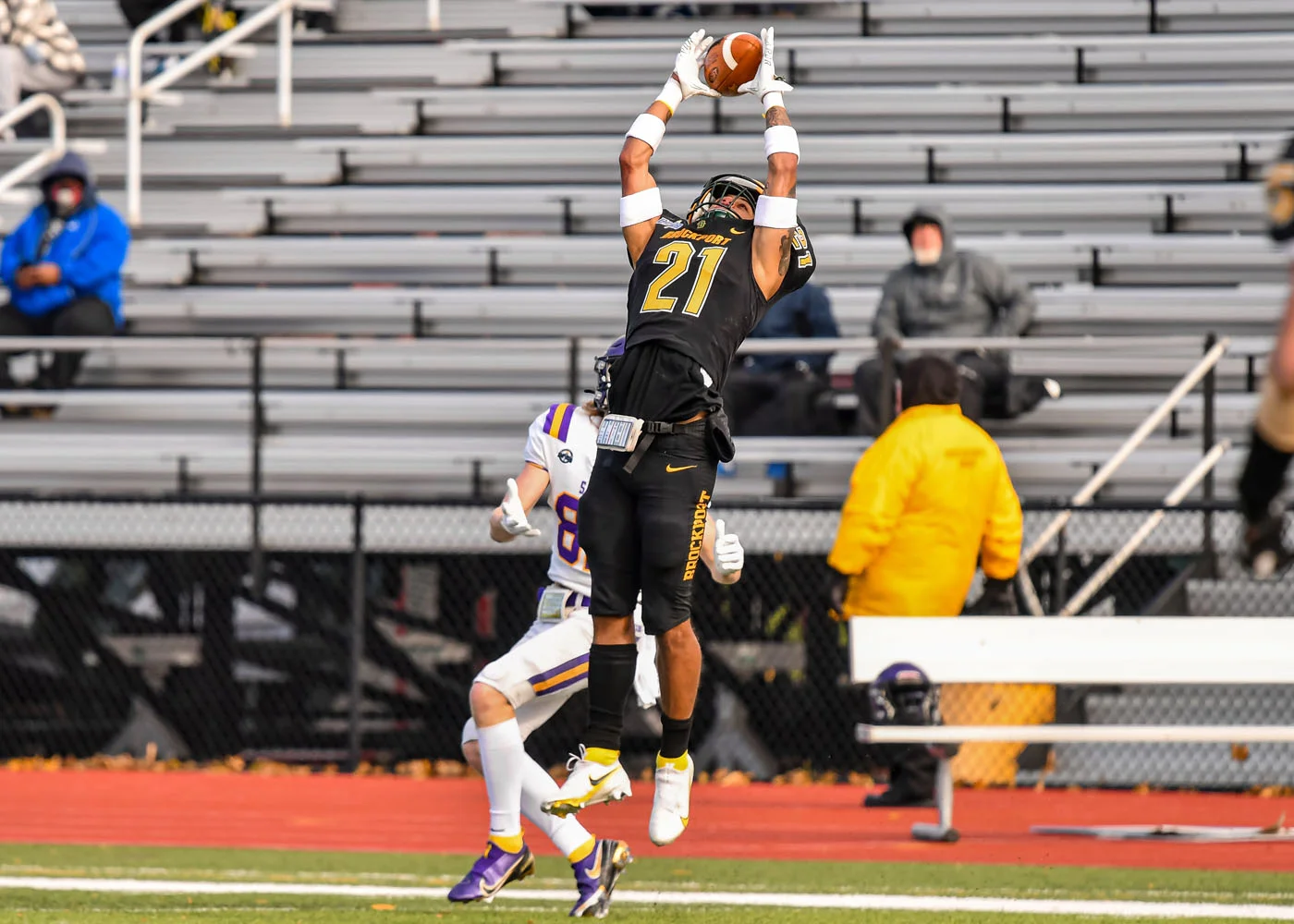 Brockport DB going up for the interception against Alfred