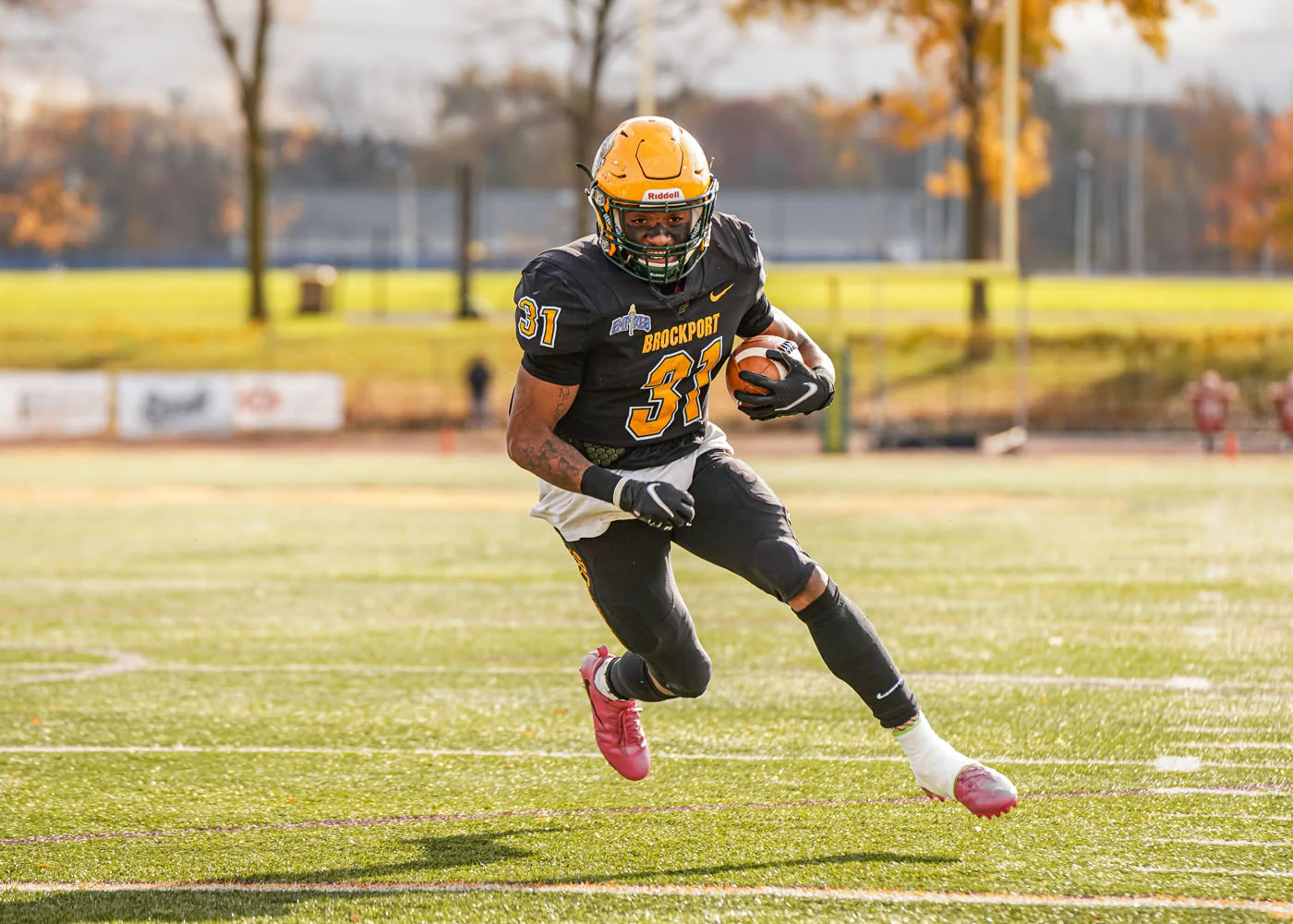 Brockport RB, Coad, running the ball into the endzone