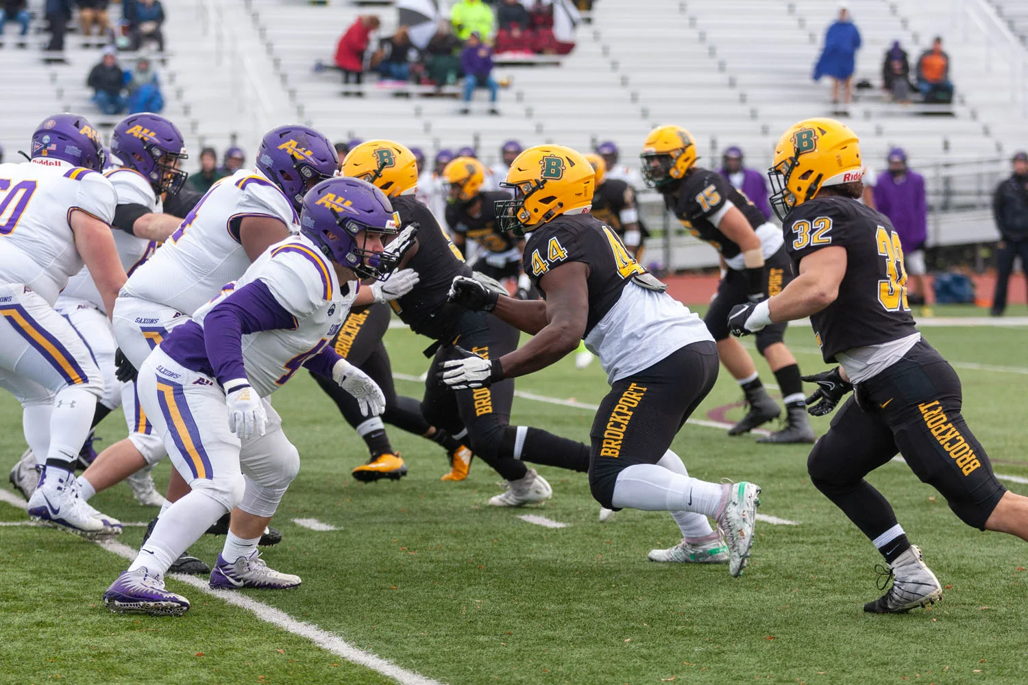 Brockport defense getting after the QB after the snap of the ball