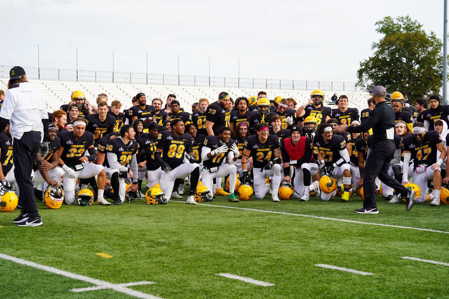 Brockport team huddle after the game with Hartwick