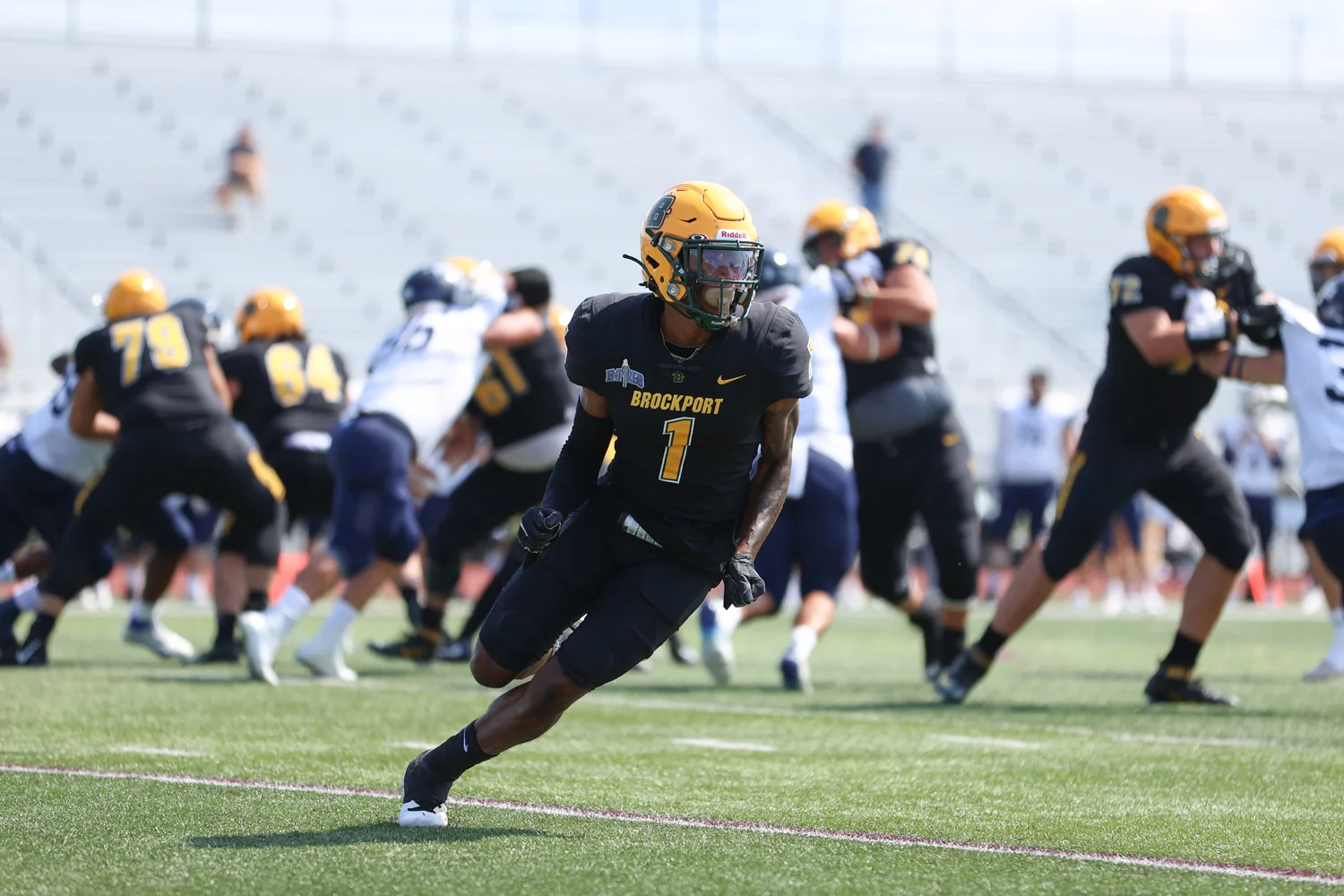 Brockport WR running his route against Ithaca