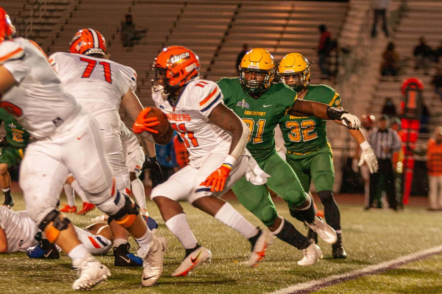 DL looking to run down the RB for Utica