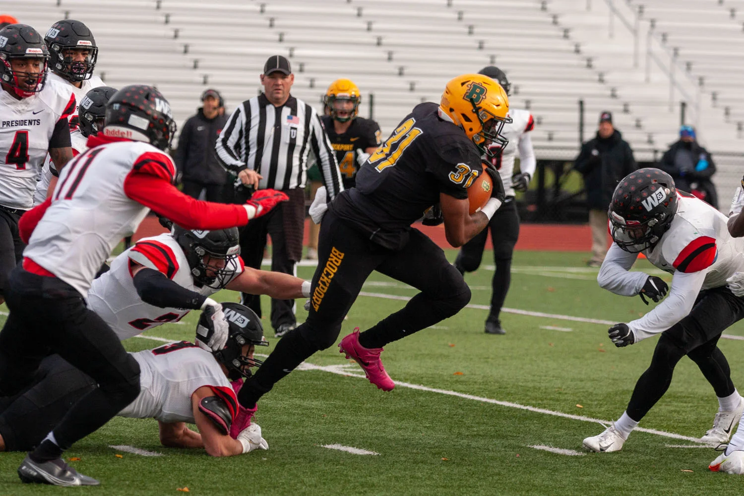 Brockport RB running to open space against WJ