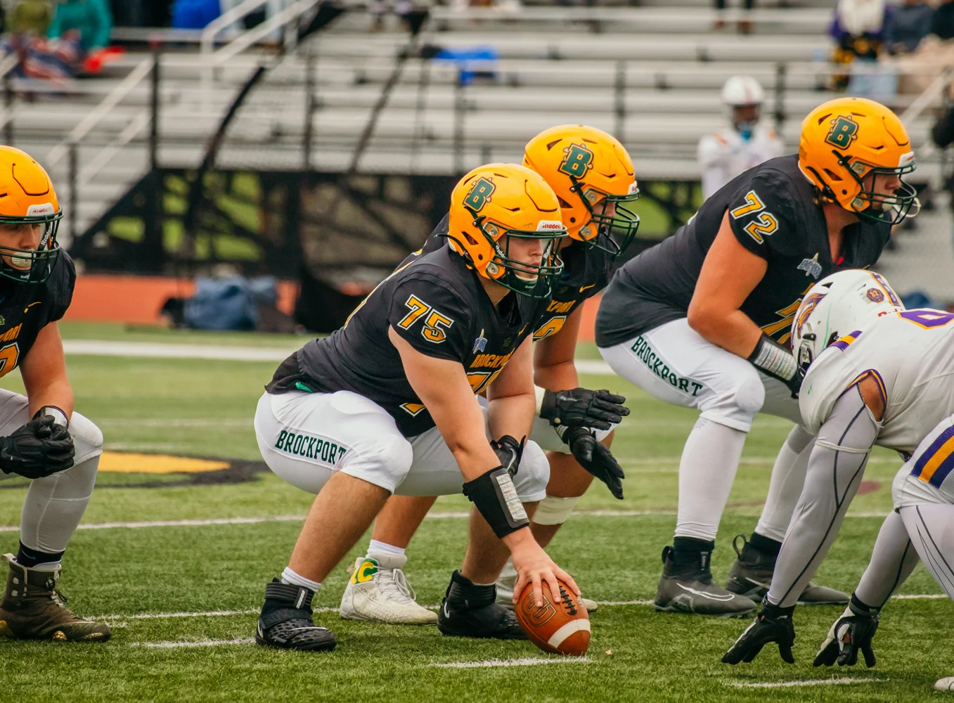 Brockport center setting the offensive line