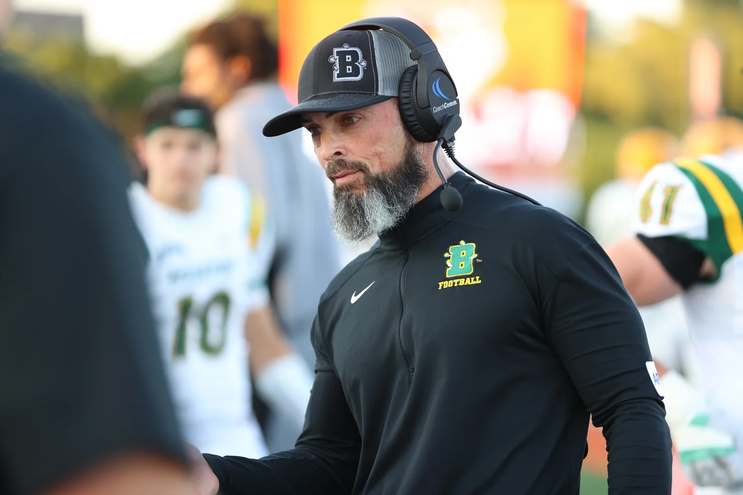 Head Coach Jason Mangone talking to the Offense