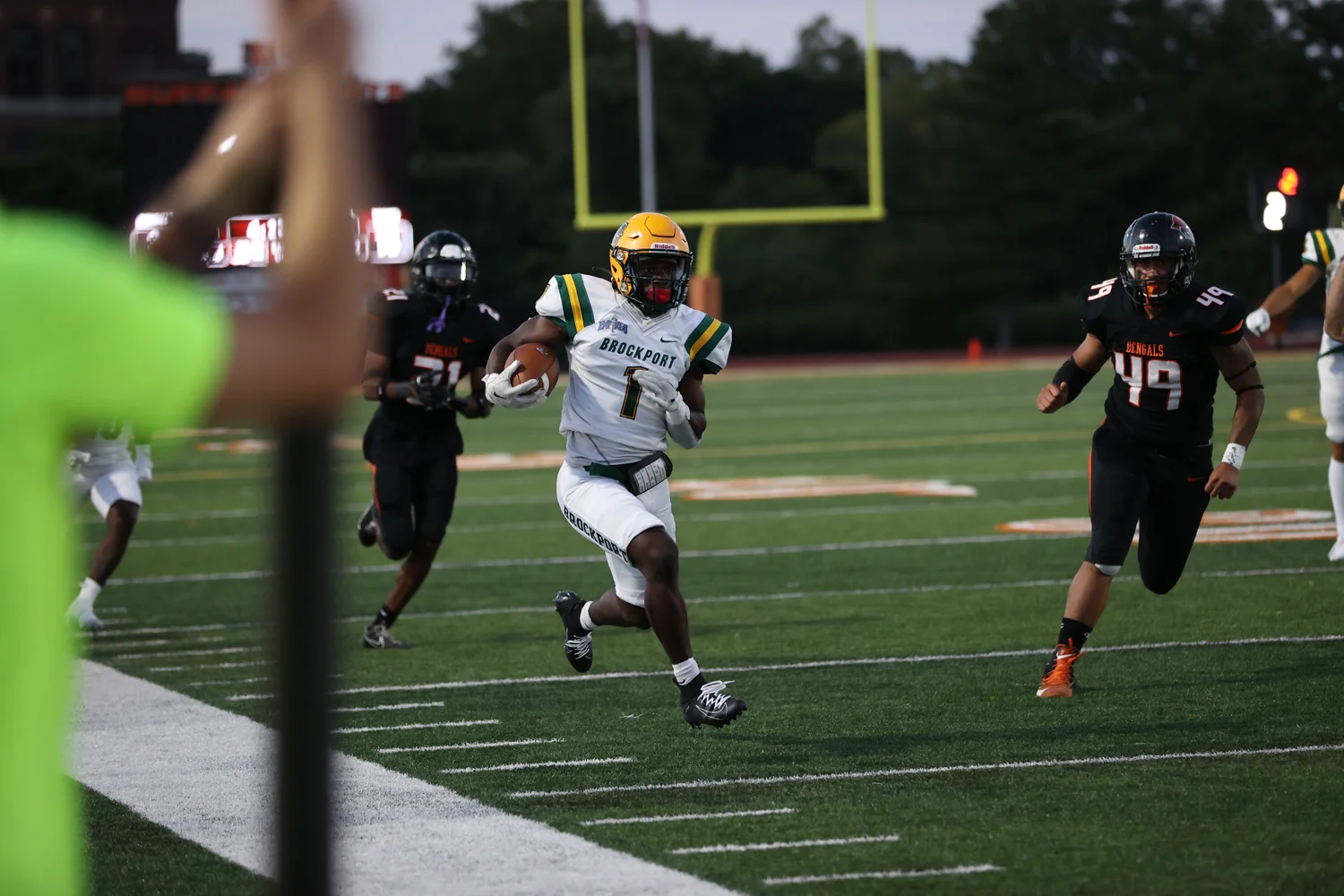 Punt Returner brings the ball back for a TD