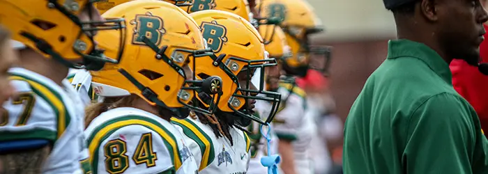 Brockport sidelines focused on the game
