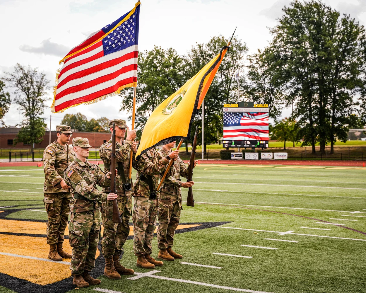 Brockport ROTC holding the flags during the National Anthem