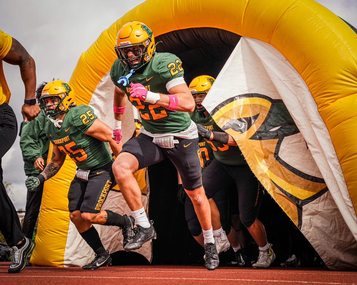 Brockport Running onto the Field