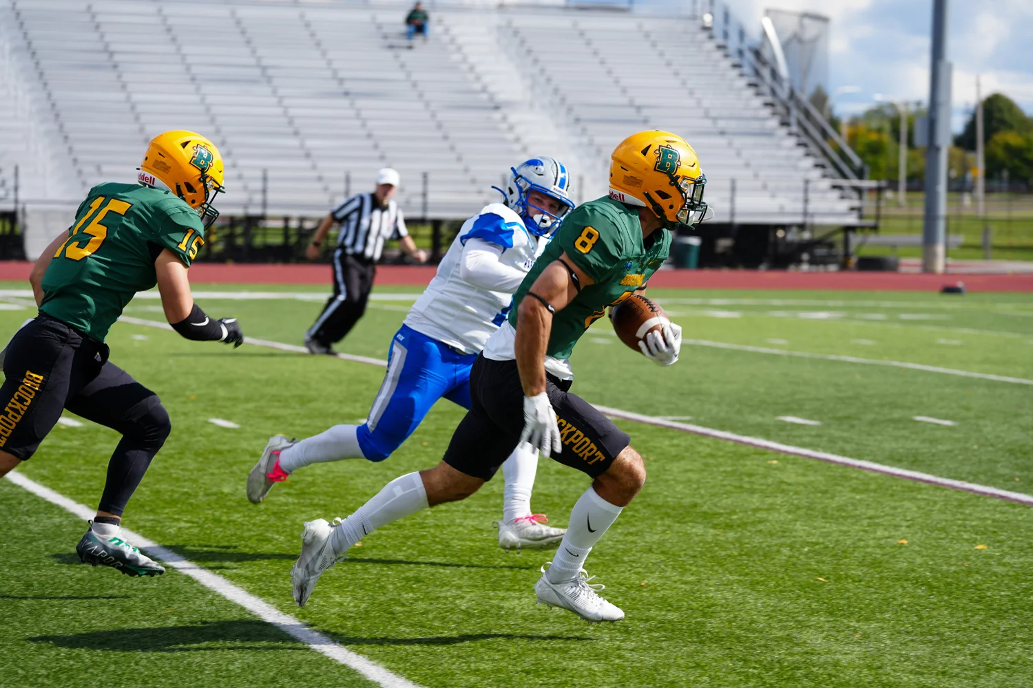 The Brockport defense bringing the ball back