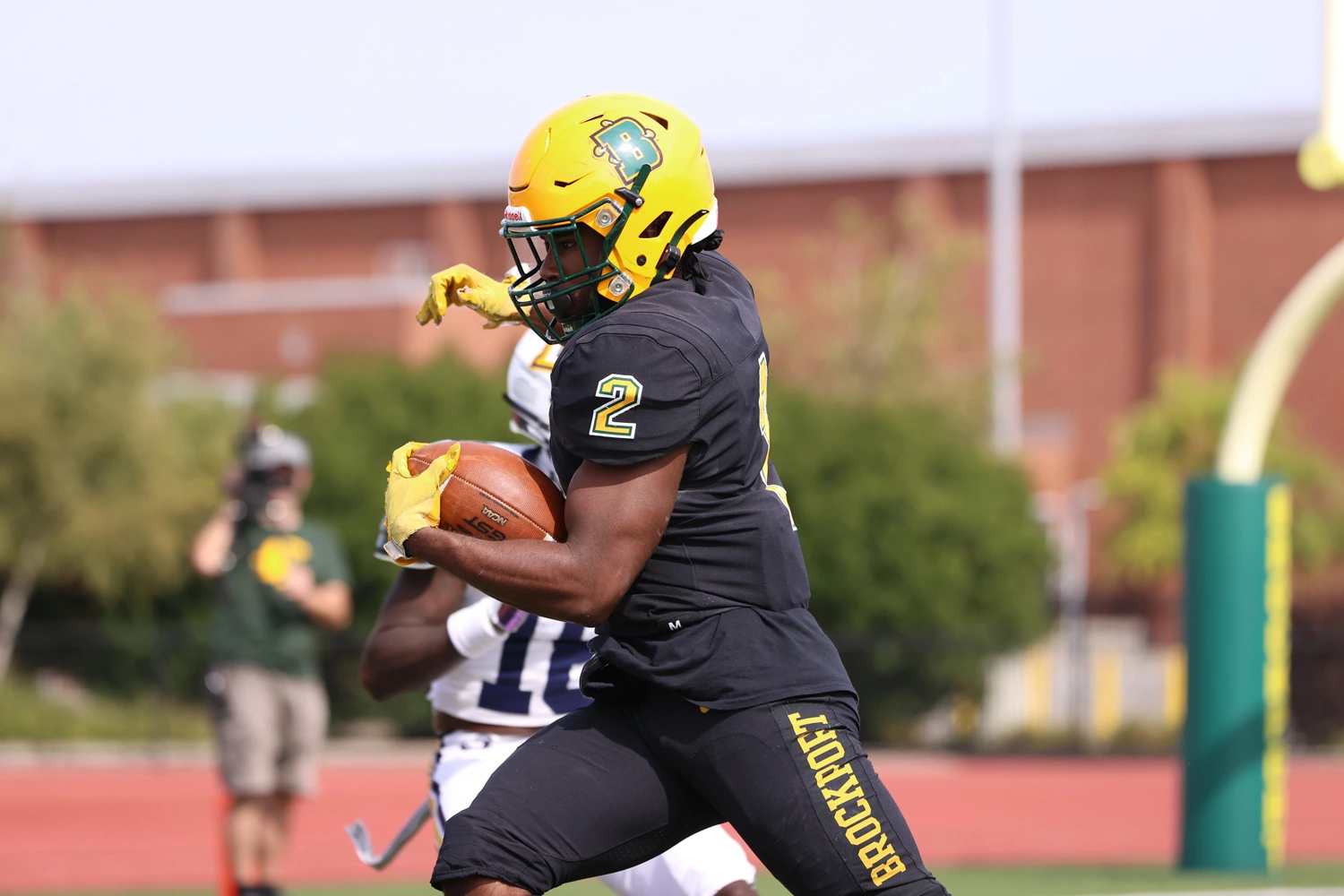 RB crossing the goalline for Brockort