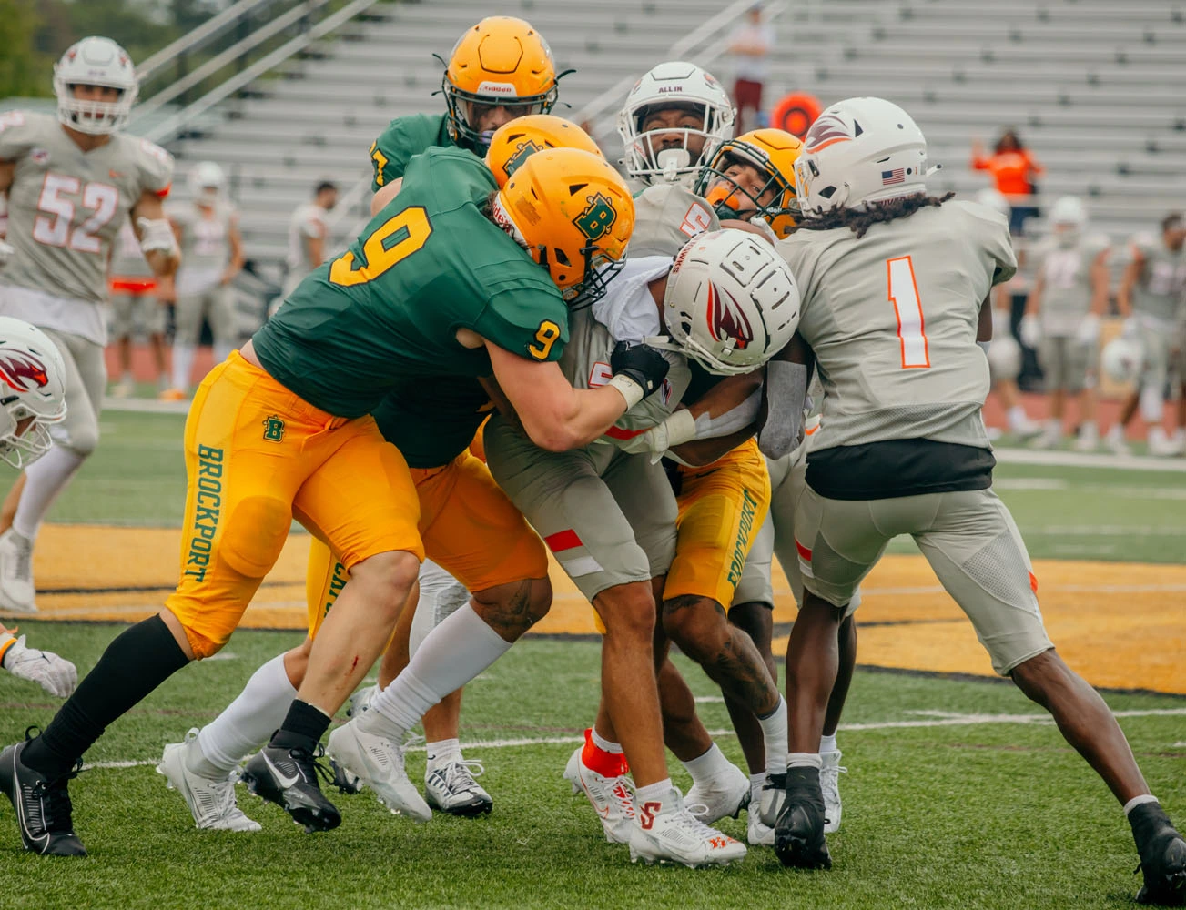 Brockport Defense with the gang tackle against the ball carrier